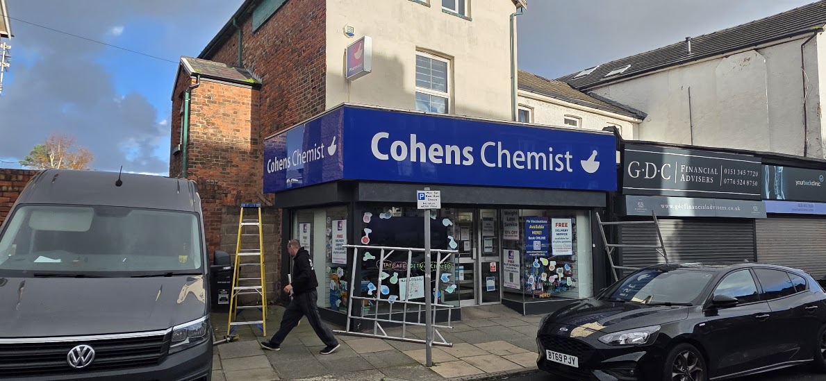 Actual completed Cohens Chemist fascia photographed at installation